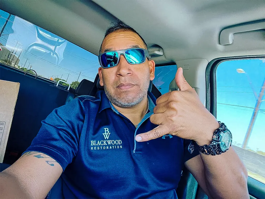 Photo of Adrian Rodriguez, operations manager of Black Wood Restoration LLC